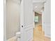 Modest half-bathroom leading into a large hallway at 3168 Kirkwood Nw Dr, Kennesaw, GA 30144