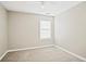 This cozy bedroom features neutral carpet and paint and has plenty of natural light at 3168 Kirkwood Nw Dr, Kennesaw, GA 30144