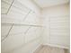 Walk-in closet features vinyl floors and wire shelves at 3168 Kirkwood Nw Dr, Kennesaw, GA 30144