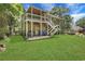 Large backyard with a two-story deck, perfect for entertaining and enjoying the outdoors at 3820 Pheasant Run Trce, Cumming, GA 30028