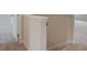 Stairway with carpeted steps leading to the lower level of the home at 406 Westmarch Cir, Loganville, GA 30052