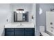 Bathroom with granite counters and wooden cabinets at 4234 Stillwater Dr, Duluth, GA 30096