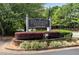 Stillwater Plantation community sign surrounded by manicured landscaping and lush greenery at 4234 Stillwater Dr, Duluth, GA 30096