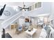 Open-concept living room with high ceilings, lots of natural light, and neutral decor at 4234 Stillwater Dr, Duluth, GA 30096