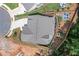 An aerial view of the home shows the roof, driveway, and landscaping at 141 Alaina Rd, Canton, GA 30115