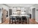 Modern kitchen with a large center island, stainless steel appliances, and seating at 141 Alaina Rd, Canton, GA 30115