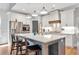 Bright kitchen featuring a center island, stainless steel appliances, and stylish pendant lighting at 141 Alaina Rd, Canton, GA 30115