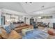 Open-concept living space with a dining table, a kitchen and modern decor at 141 Alaina Rd, Canton, GA 30115