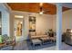 Covered patio with a wood ceiling, furniture, and grill at 141 Alaina Rd, Canton, GA 30115