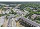 This aerial shows the layout of townhomes, apartments, parking, and surrounding area at 387 Skylar Se Way, Atlanta, GA 30315