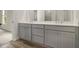 Bathroom vanity with double sinks, ample counter space, and plenty of storage at 387 Skylar Se Way, Atlanta, GA 30315