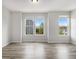 Spacious empty room with hardwood floors and natural light at 387 Skylar Se Way, Atlanta, GA 30315
