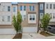 Beautiful townhome with multiple windows and attached garages at 387 Skylar Se Way, Atlanta, GA 30315
