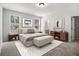 Bright main bedroom with natural light, neutral decor, and ensuite bathroom access at 387 Skylar Se Way, Atlanta, GA 30315