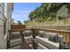 Cozy outdoor patio area with stylish seating and a tranquil garden view at 387 Skylar Se Way, Atlanta, GA 30315