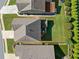 Aerial view of property showcasing the home's layout, landscaping, and surrounding neighborhood at 408 Honeybee Ln, Canton, GA 30115
