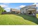 Spacious, well-kept backyard offers a patio and lush lawn for outdoor enjoyment at 408 Honeybee Ln, Canton, GA 30115