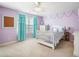 Bedroom with purple walls and white furniture at 408 Honeybee Ln, Canton, GA 30115