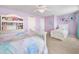 Charming bedroom with two beds and coordinated decor at 408 Honeybee Ln, Canton, GA 30115