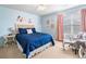 Comfortable bedroom with a plush bed, soft carpet, and coordinated decor at 408 Honeybee Ln, Canton, GA 30115