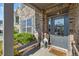 Close-up of a stylish front door with glass panels, sidelights, and a 'Welcome' mat, showcasing a warm invitation at 408 Honeybee Ln, Canton, GA 30115