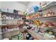 Walk-in pantry with metal shelving fully stocked with food and containers for optimal organization at 408 Honeybee Ln, Canton, GA 30115