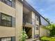 Exterior of building with stairs leading to units at 53 Monet Nw Ct, Atlanta, GA 30327