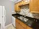 Kitchen featuring granite countertops and stainless steel appliances at 53 Monet Nw Ct, Atlanta, GA 30327