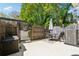 Fenced backyard with patio area, perfect for outdoor seating and entertaining at 135 N North River Dr, Atlanta, GA 30350
