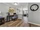 Cozy office and living room combo that features wood-look floors and a neutral color scheme at 135 N North River Dr, Atlanta, GA 30350
