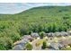 Aerial view of a neighborhood with a mountain in the background at 229 Brookview Pl, Woodstock, GA 30188