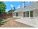 Backyard with a concrete patio and a wood fence at 229 Brookview Pl, Woodstock, GA 30188