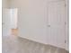 Bedroom with neutral carpet, two closets, and direct access to hallway at 229 Brookview Pl, Woodstock, GA 30188