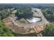 Aerial shot of new home construction near the pond and trees in a developing neighborhood at 2723 Byess Ct, Marietta, GA 30064