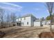 Large backyard with covered porch on a two-story home, ready for outdoor entertaining at 2723 Byess Ct, Marietta, GA 30064