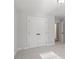 Bedroom with double closet doors, neutral carpet, and a view to the hallway at 2723 Byess Ct, Marietta, GA 30064