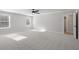 Large bedroom features neutral walls, two windows and ceiling fan, ready for furniture at 2723 Byess Ct, Marietta, GA 30064