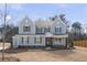Charming two-story home with a combination of brick and siding and a well-manicured lawn at 2723 Byess Ct, Marietta, GA 30064