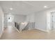 Bright upstairs hallway features wood floors, metal railing, and ample natural light at 2723 Byess Ct, Marietta, GA 30064