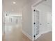 Bright, open-concept living room with wood floors and white trim showcases natural light and access to a private office at 2723 Byess Ct, Marietta, GA 30064