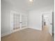 Stylish office with French doors leading to adjacent rooms and durable wood floors at 2723 Byess Ct, Marietta, GA 30064