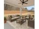 Covered patio with outdoor seating and a ceiling fan at 2723 Byess Ct, Marietta, GA 30064