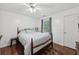 Bedroom with hardwood flooring, ceiling fan, and a cozy feel at 4261 Vineyard Trl, Snellville, GA 30039
