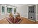 Bright dining room with bay windows and a gray door with a pet entrance at 4261 Vineyard Trl, Snellville, GA 30039