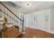 Entryway with beautiful hardwood floors and staircase at 4261 Vineyard Trl, Snellville, GA 30039