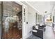Charming front porch with seating area and decorative door at 4261 Vineyard Trl, Snellville, GA 30039