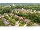A charming neighborhood nestled among lush trees, showcasing a variety of beautiful homes at 4960 Tadmore Ln, Lithonia, GA 30038