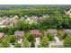 A picturesque residential area featuring well-spaced homes and lush green trees at 4960 Tadmore Ln, Lithonia, GA 30038