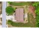 A bird's eye view of a home with a neatly trimmed lawn and an inviting driveway at 4960 Tadmore Ln, Lithonia, GA 30038