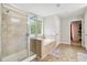Bright bathroom featuring a separate shower and soaking tub, providing a spa-like retreat at 4960 Tadmore Ln, Lithonia, GA 30038